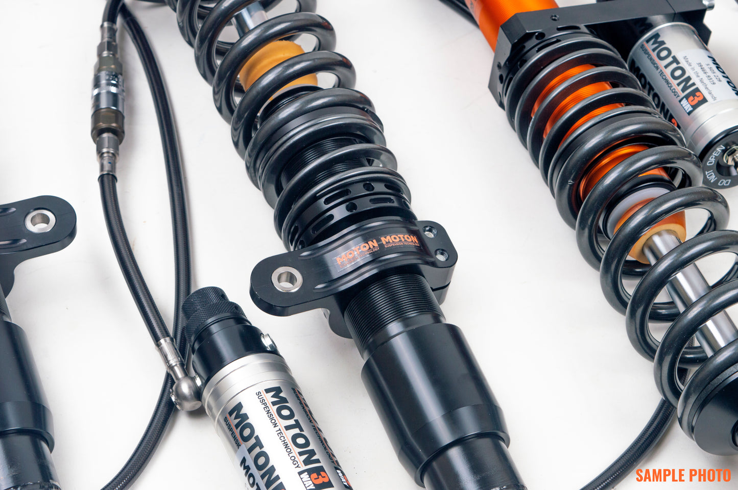 3-WAY Adj Coilovers In Rebound  Low- And High Speed Compression  Incl Canisters.